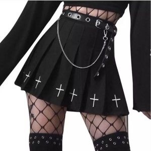 Pleated cross skirt with built in shorts. Stretchy and cute.